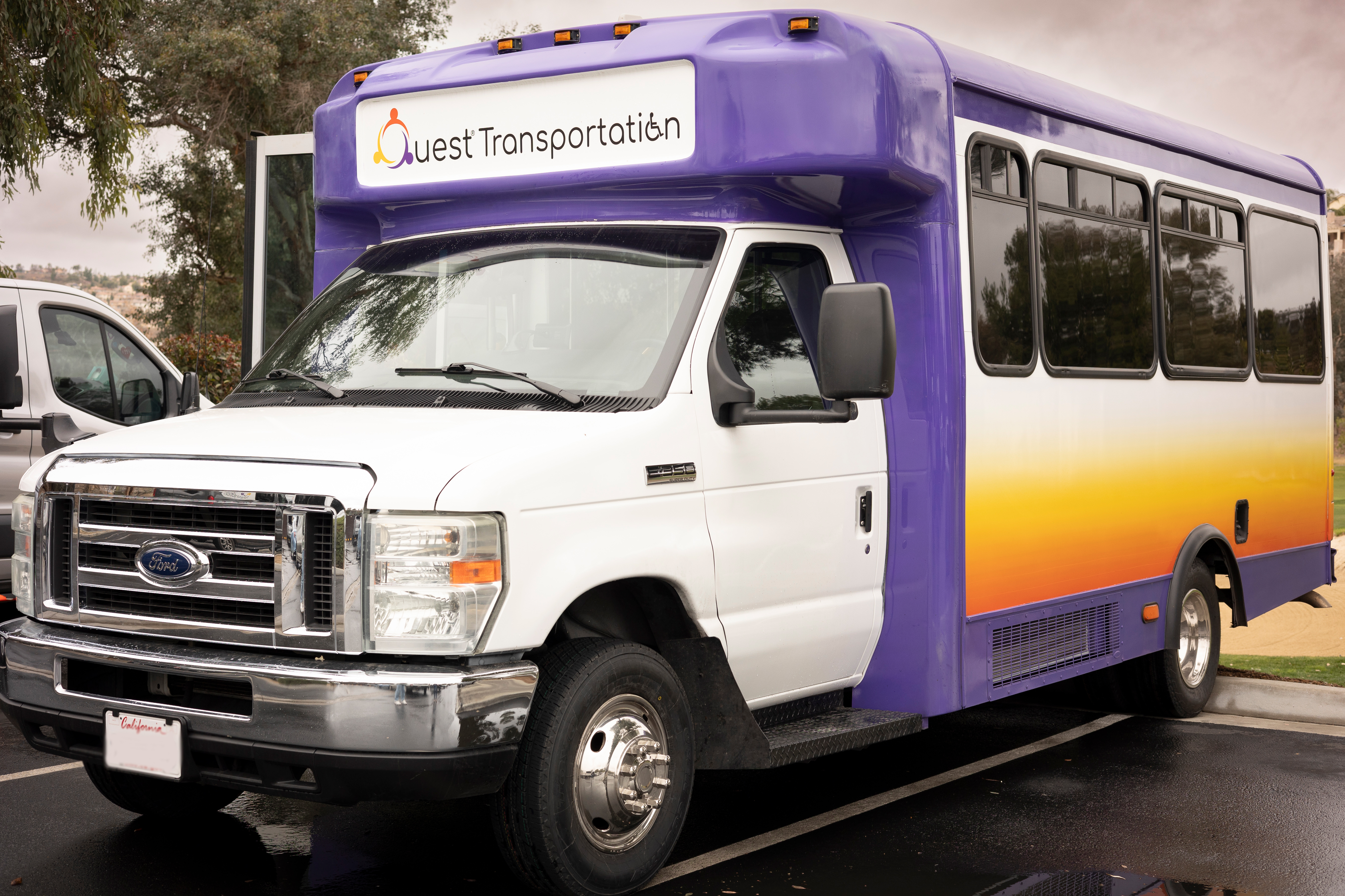A Quest Transportation Ford E-350 cutaway. Aftermarket upfit shown.